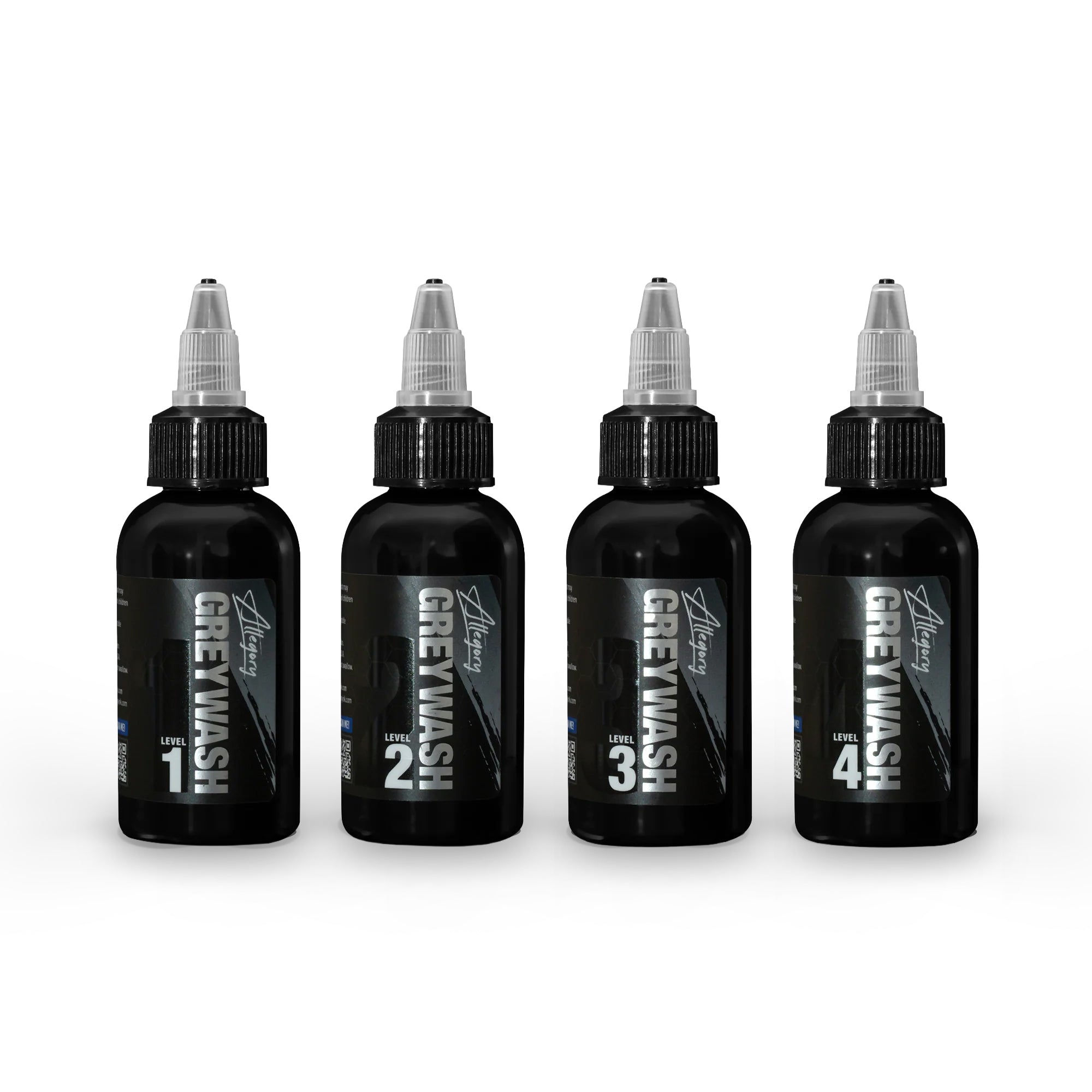 Four bottles of Greywash tattoo ink on a white background | Gallery Allegory Ink